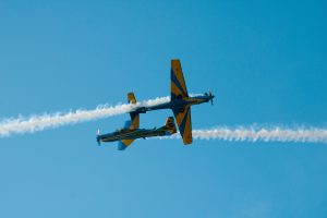 planes and their contrails in the sky